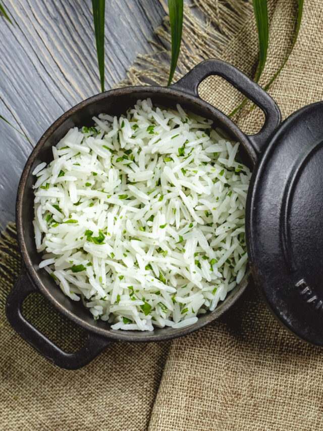cropped-boiled-rice-with-herbs-pan-wooden-table-scaled-1.jpg