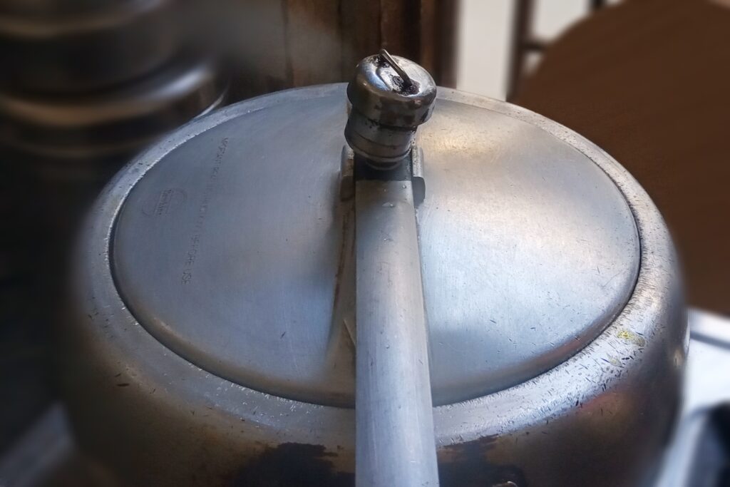 Pressure cooking sabut urad dal