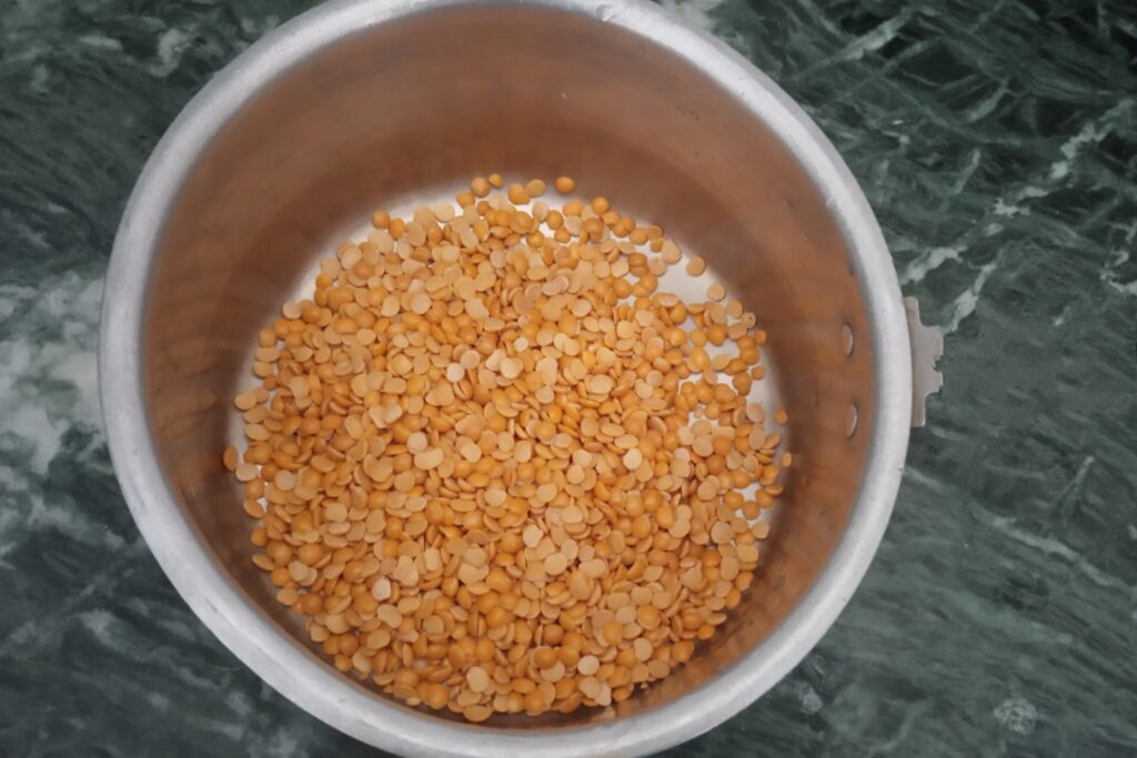 Take toor dal in a bowl for wash
