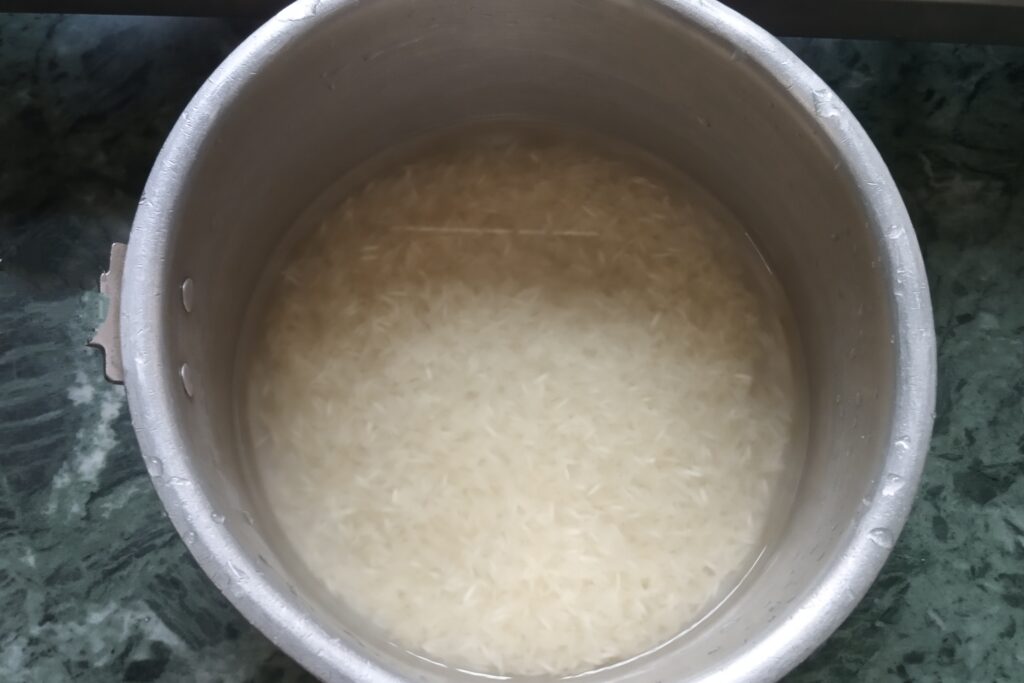 Soaked basmati rice in water before cooking