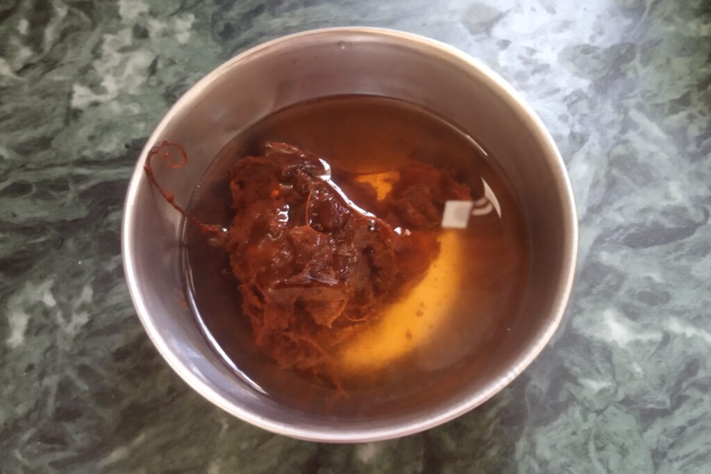 soaking tamarind in hot water for jal jeera recipe