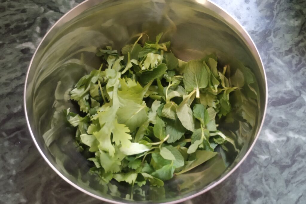 removing stems from mint or coriander leaves