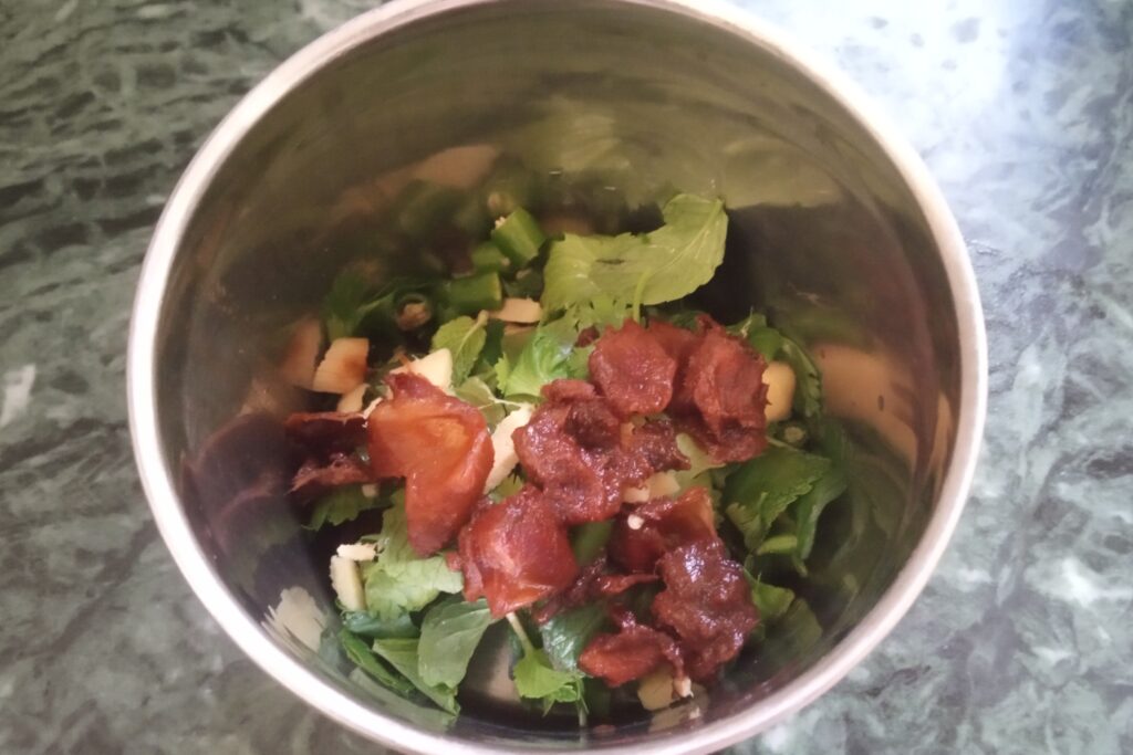 adding extracted tamarind with other ingredients