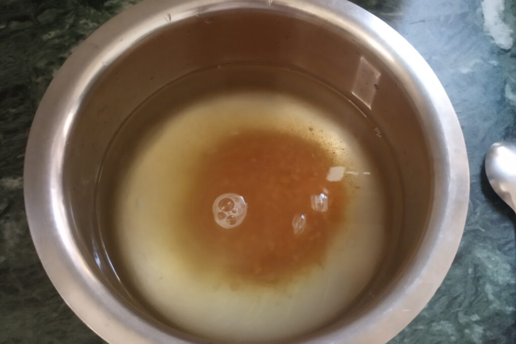 mixing jaggery to the water