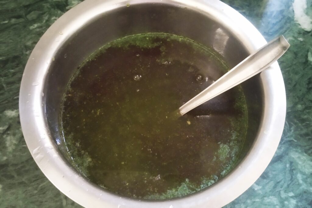 mixing jal jeera masala with water  and lemon juice