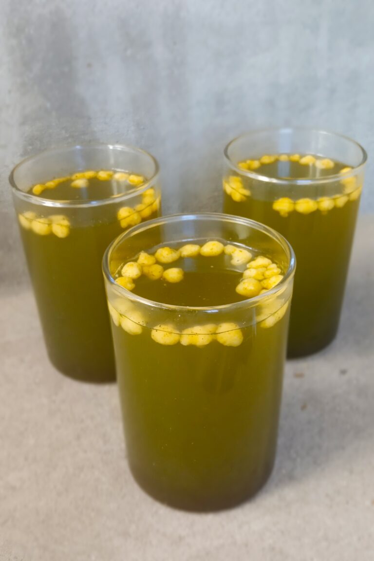 jal jeera recipe served in a glass with a garnish of boondi
