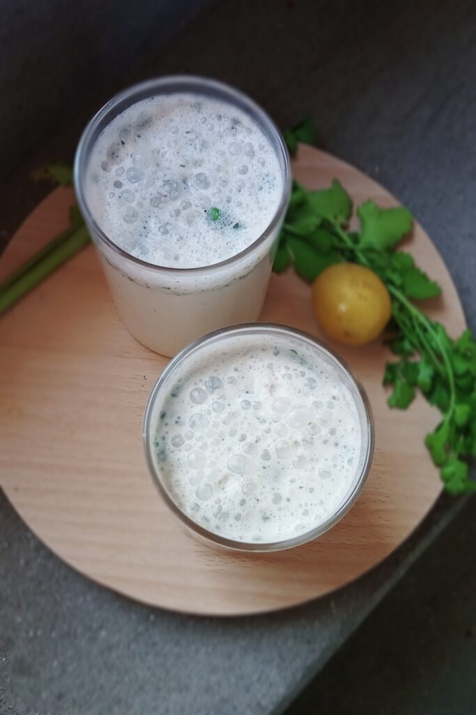 masala chaas recipe served with coriander leaves garnish