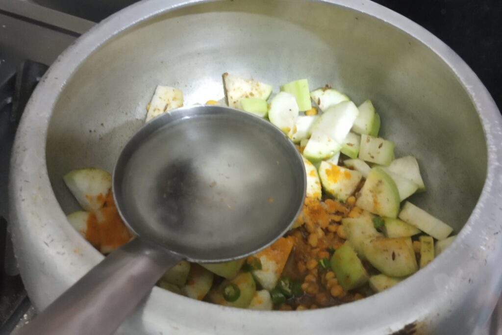 adding water to mixing ingredients