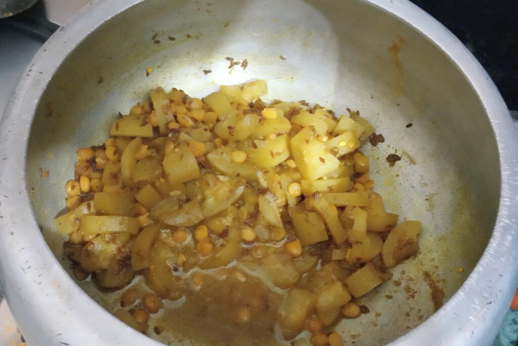 cooking lauki chana dal until dry