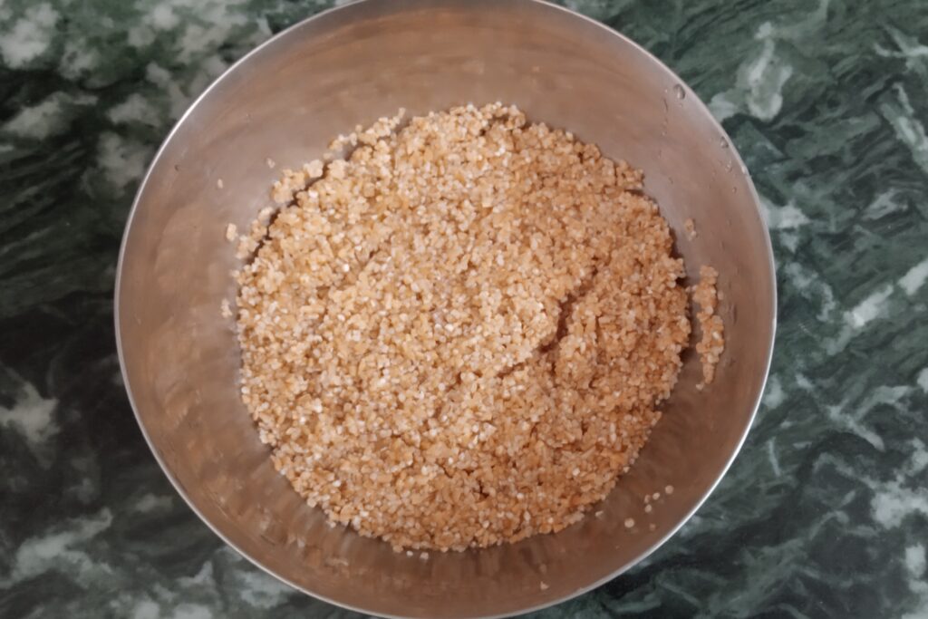 washed broken wheat in  a bowl