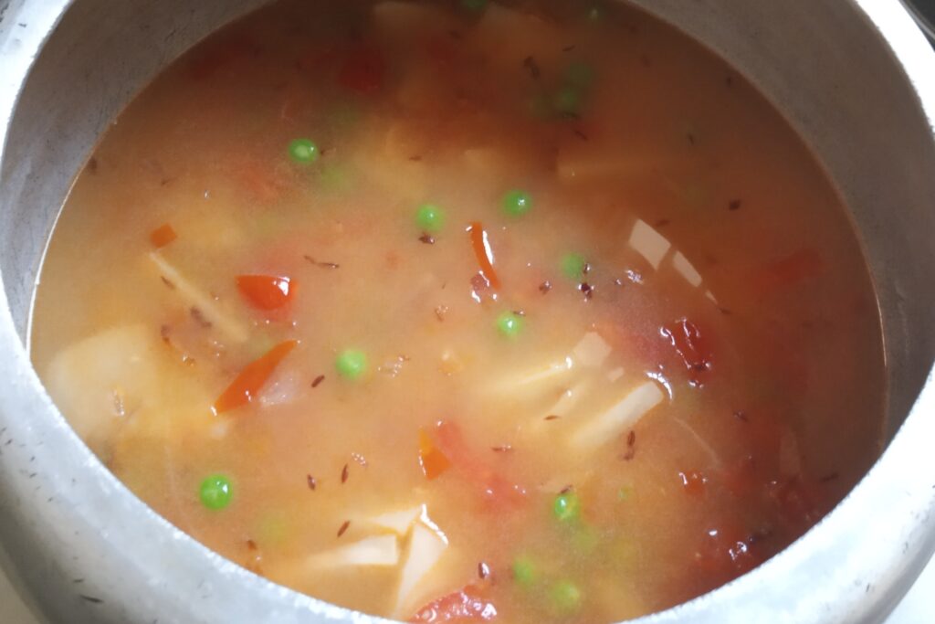 mixing all ingredients and pressure cook