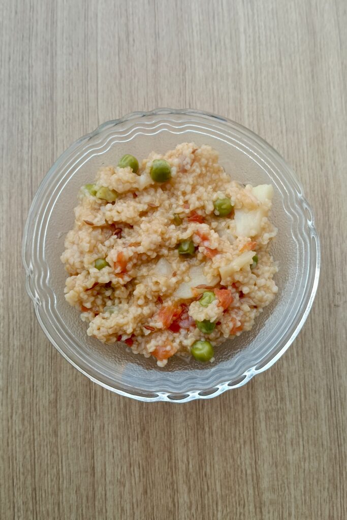 vegetable daliya recipe served in a glass bowl