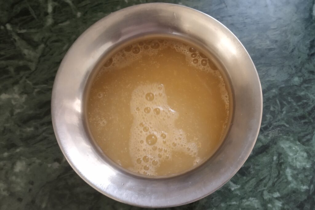 mixing ingredients for sattu sharbat