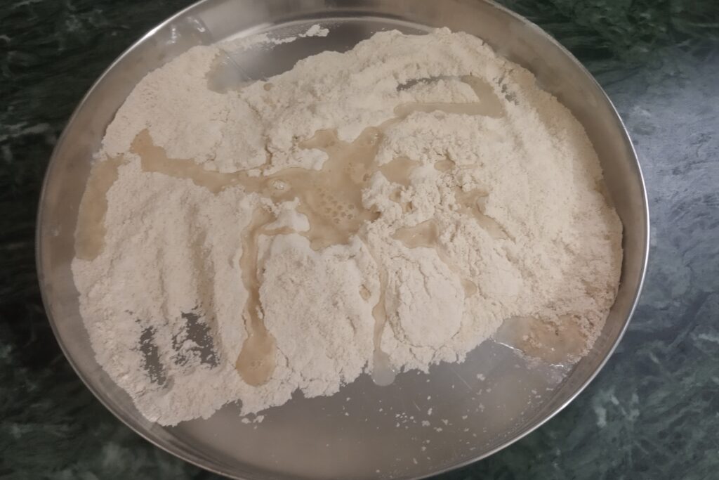 adding water to make dough