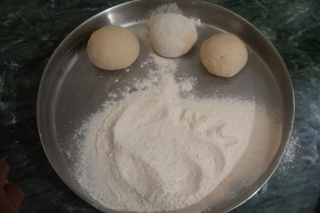 making doughballs from kneaded dough