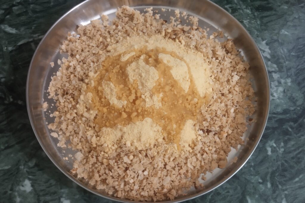 adding sugar and ghee