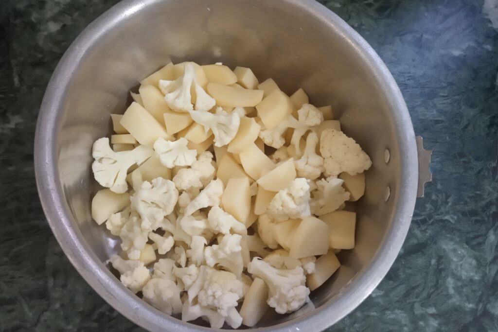 chopped cauliflower and potatoes in a bowl