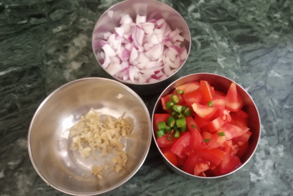 chopped onion tomato and ginger paste