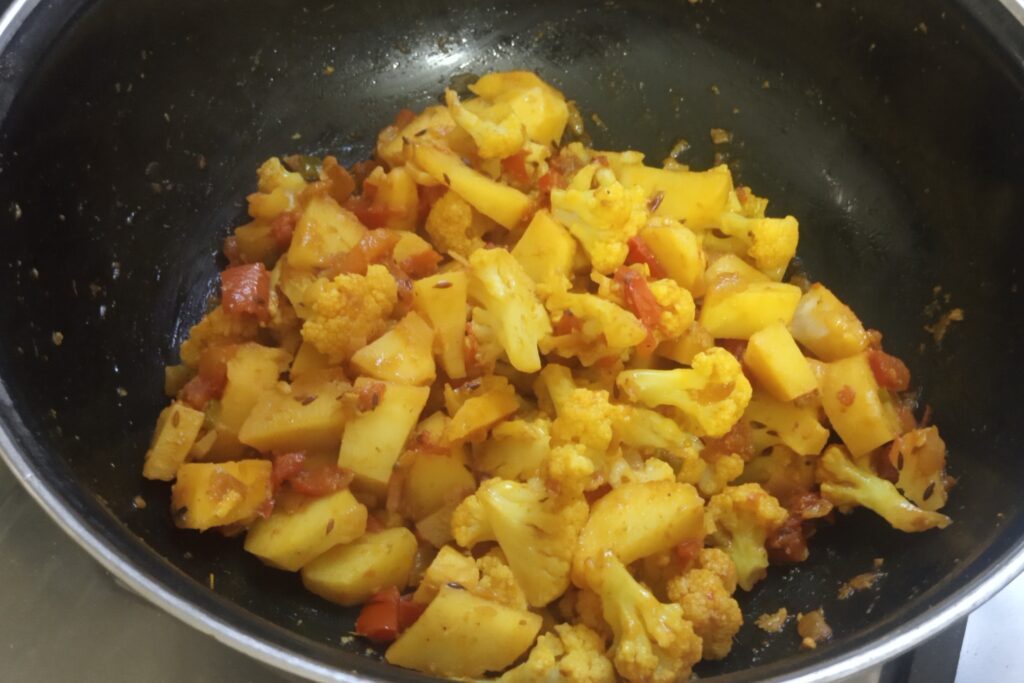 the aloo gobhi sabzi is ready to serve