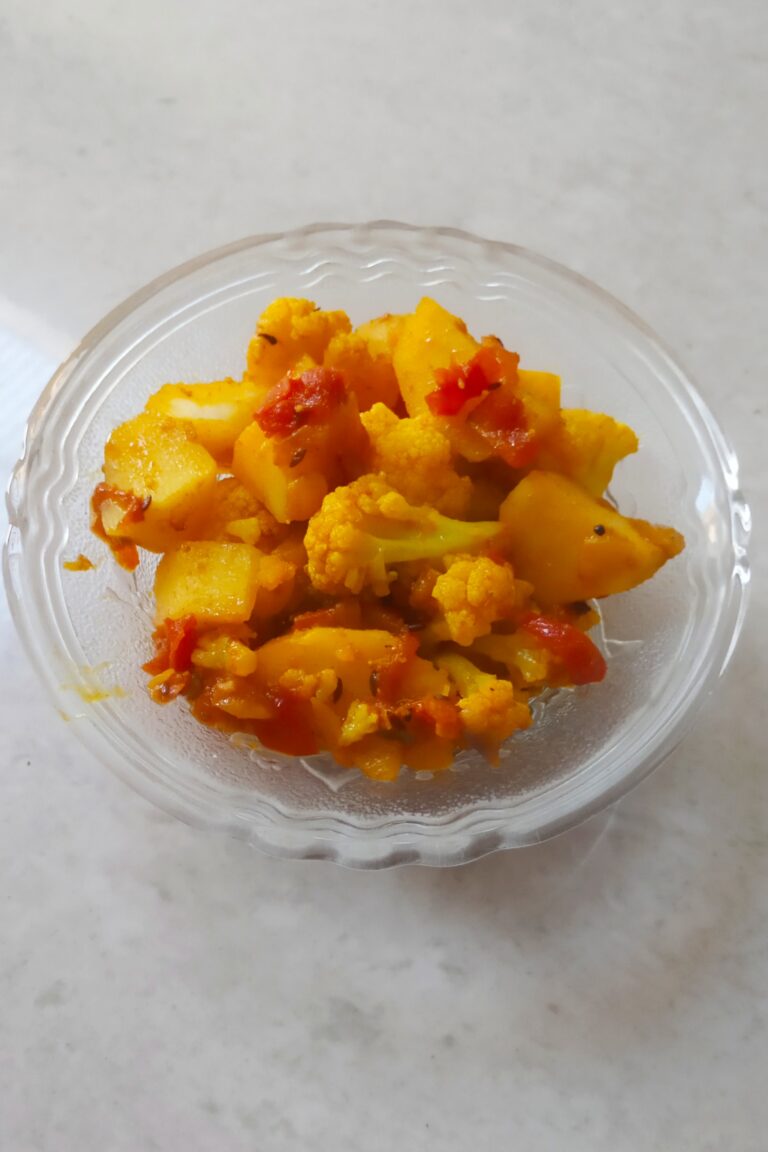 aloo gobhi sabzi served in a bowl