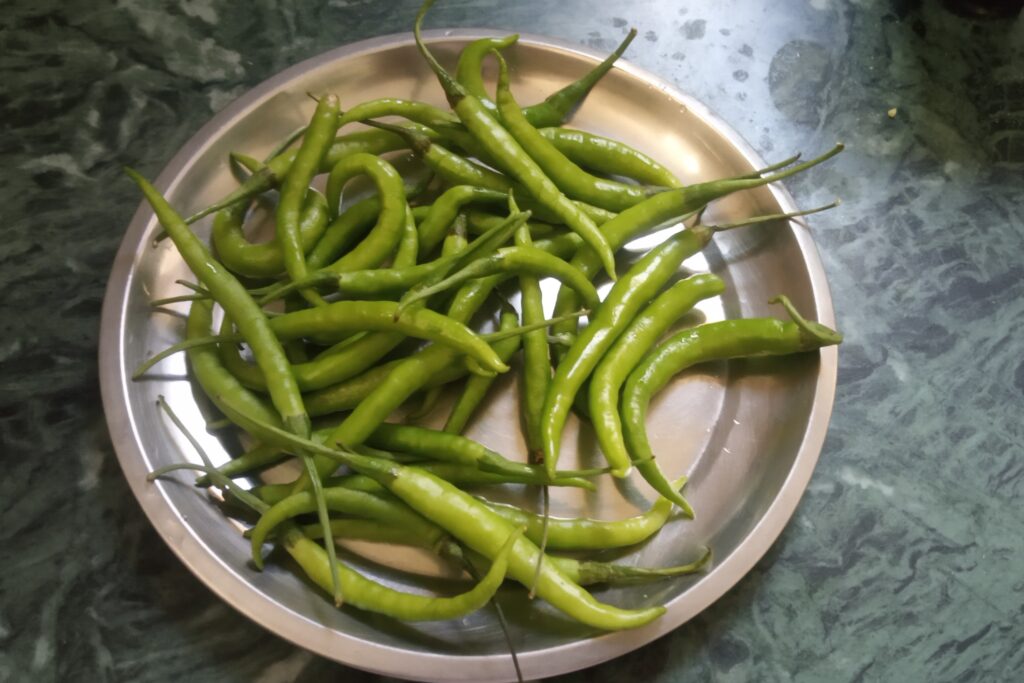washed green chilies in a plate