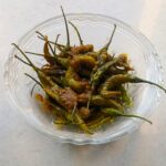 hari mirch ka achar served in a bowl