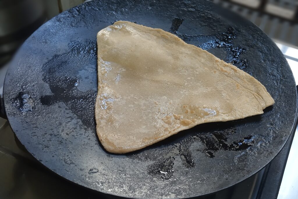 applying ghee on triangle