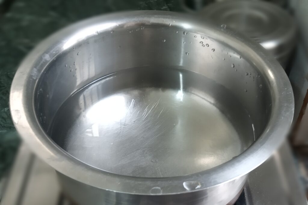 boiling water in a deep pan