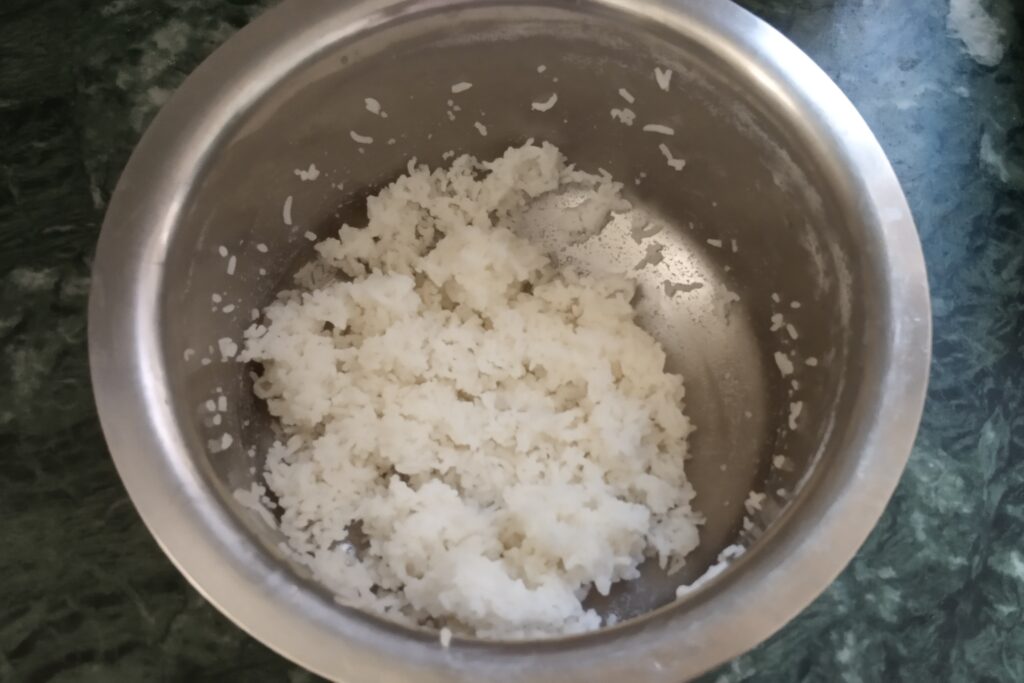 cooked rice in a mixing bowl