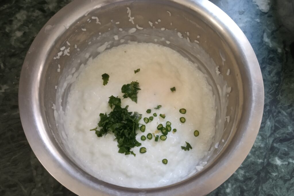 adding coriander leaves and green chili