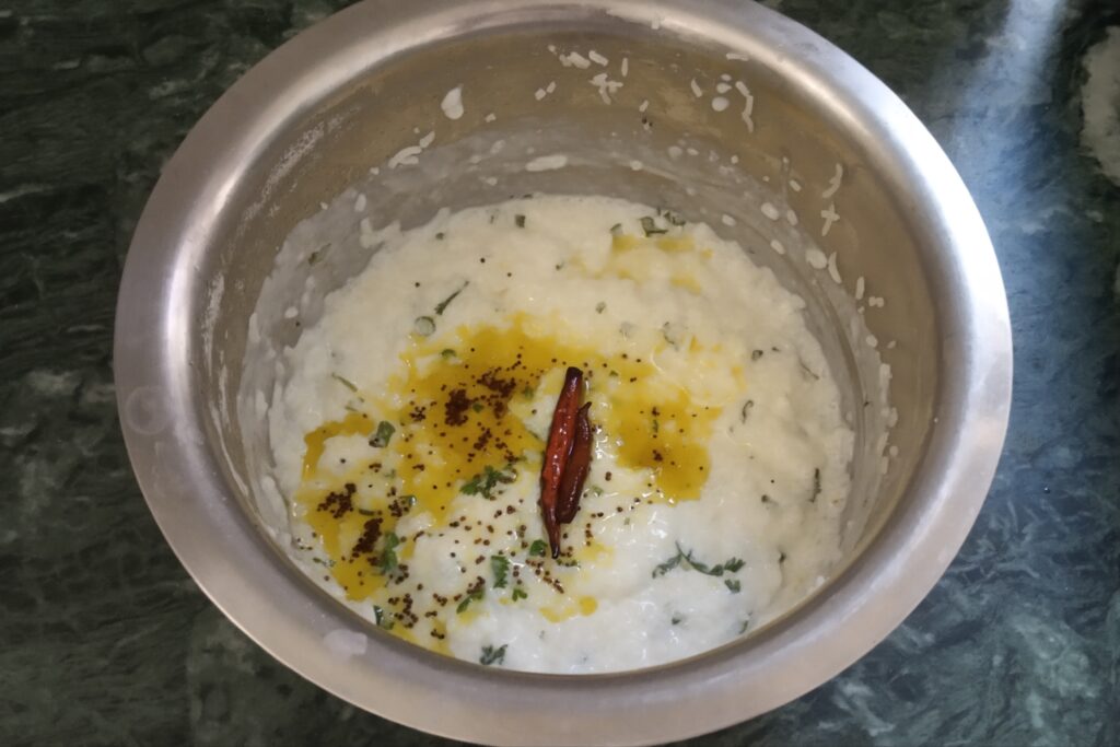 pour tempering over curd rice