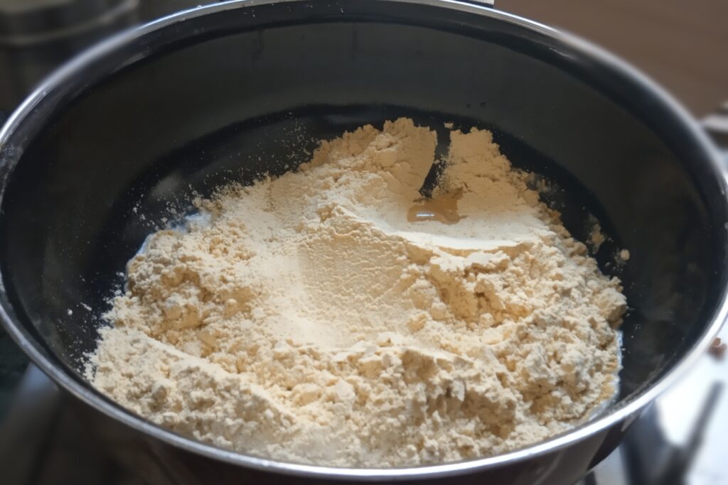 adding sattu to the heated ghee