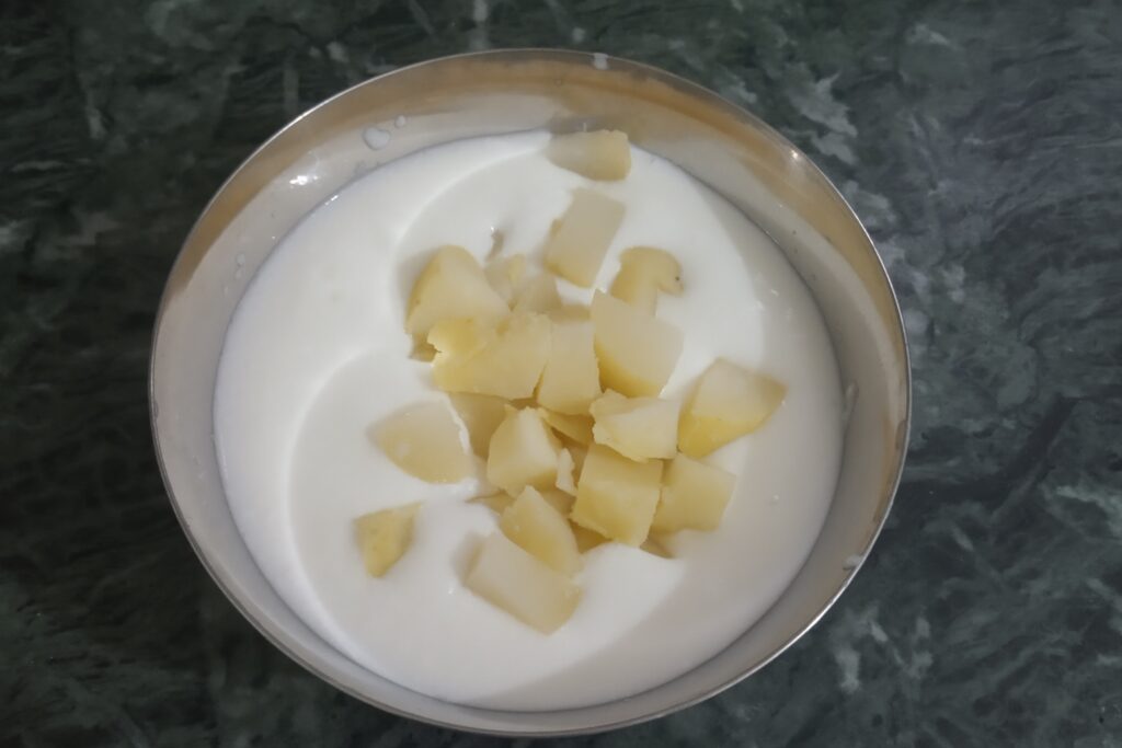 adding chopped boiled potatoes 