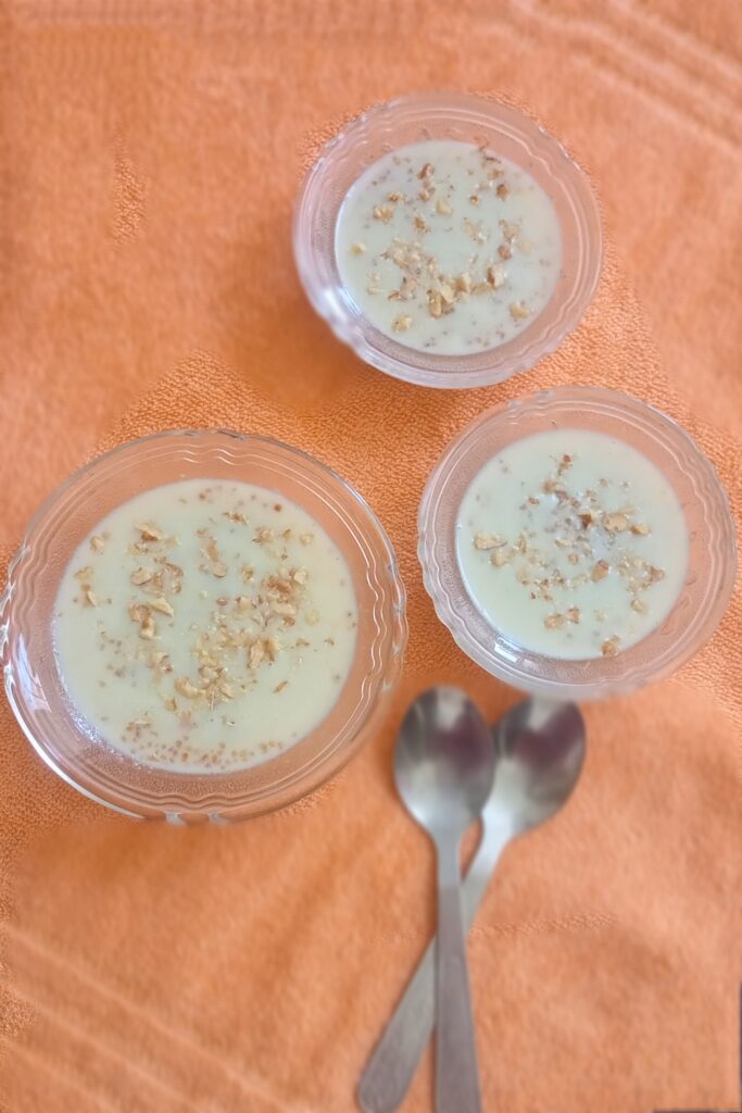 meetha daliya garnished with chopped walnuts