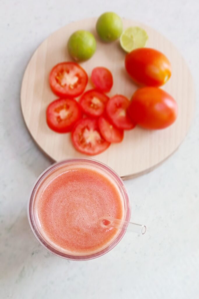 top shot of tomato juice and vegetables