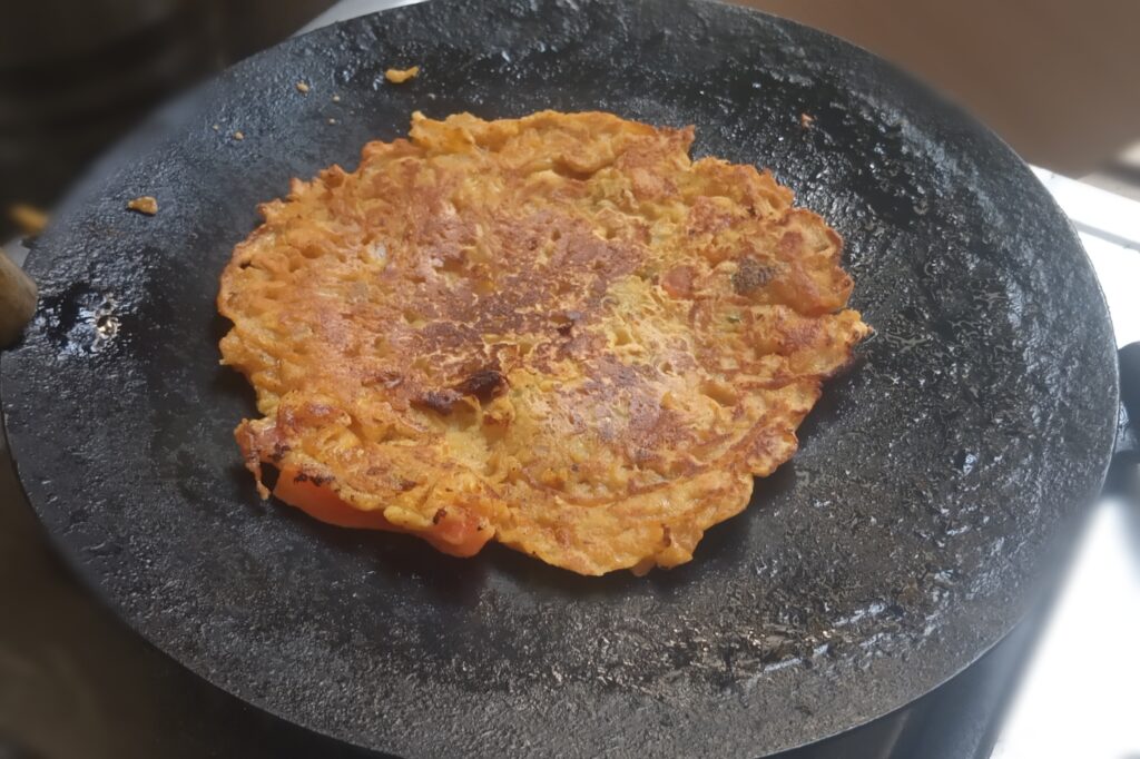 cooking sattu chilla on medium heat