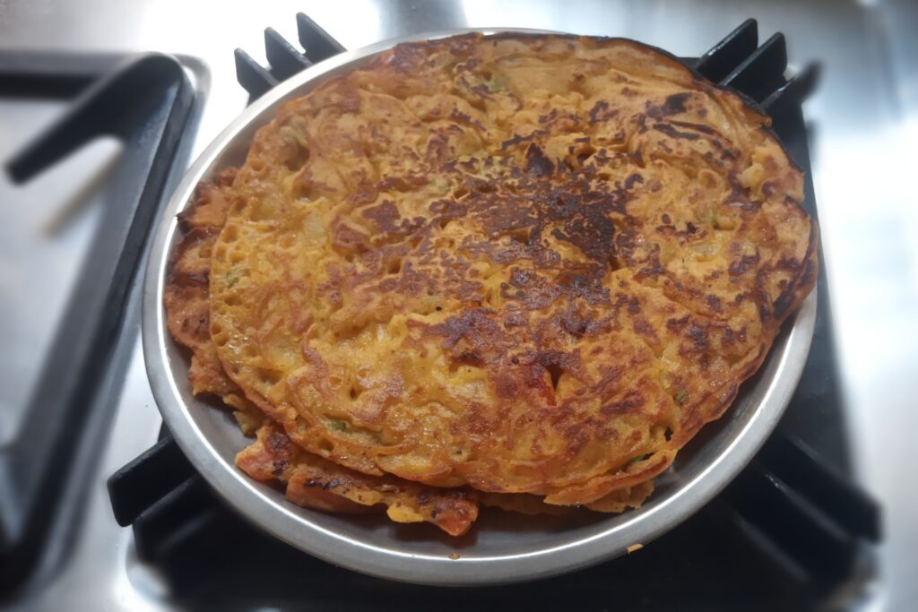 the sattu chilla placed in a plate