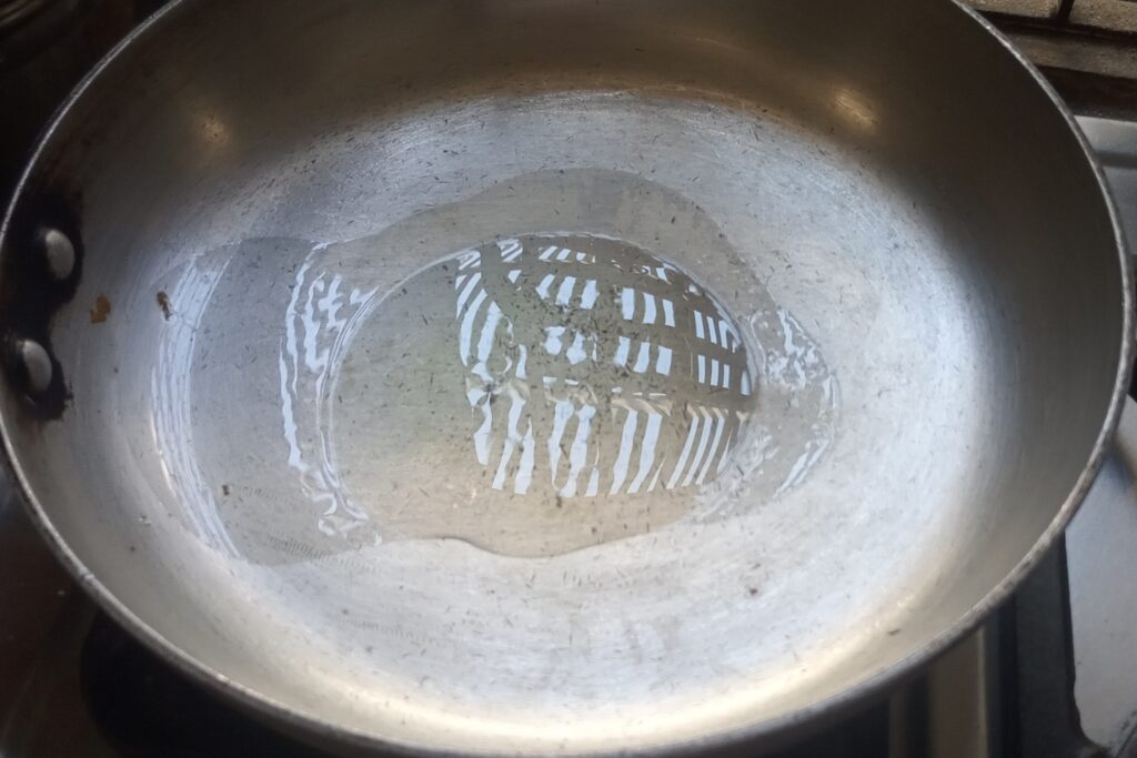 heating ghee in a pan