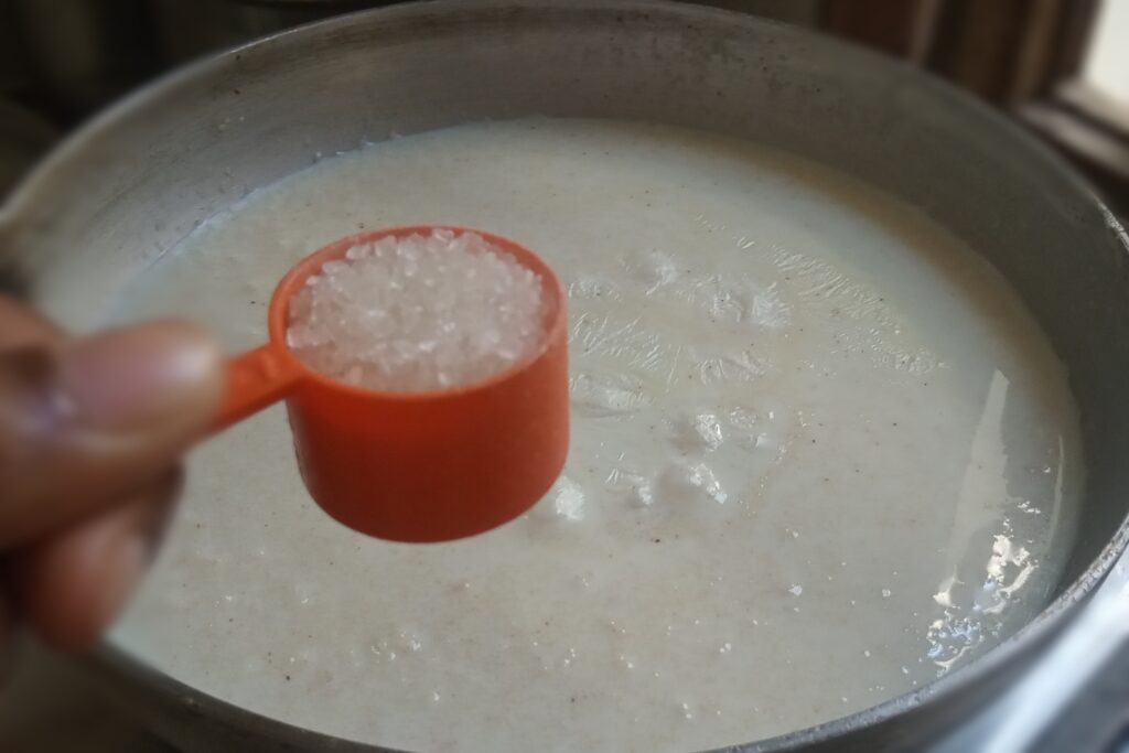 adding white sugar to the kheer