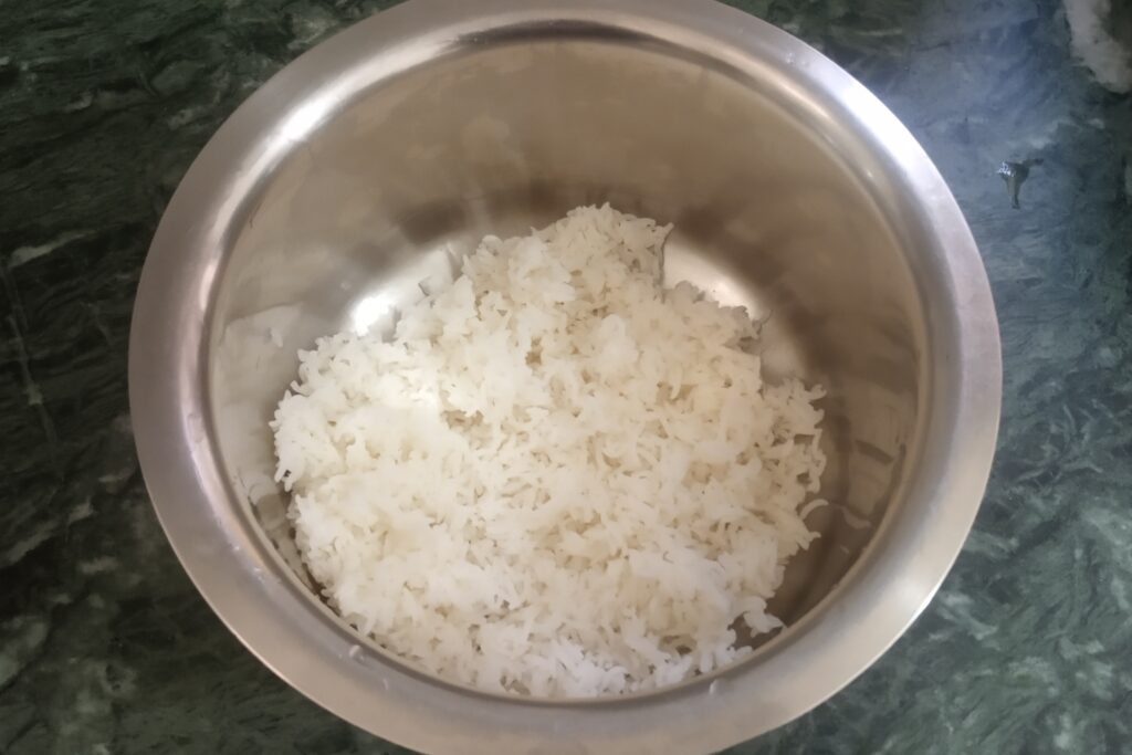 cooled and firm cooked rice in a bowl