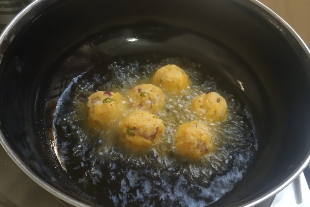 adding balls in the heated oil
