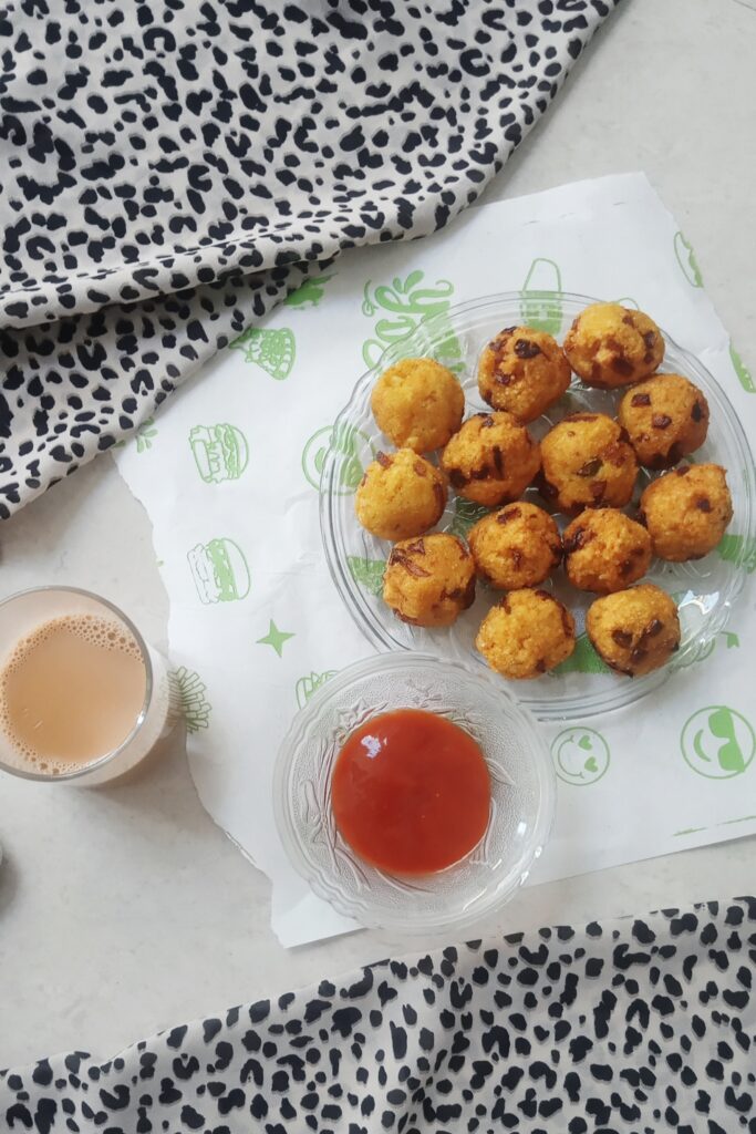 top shot of leftover rice pakora, tomato ketchup or a glass of tea
