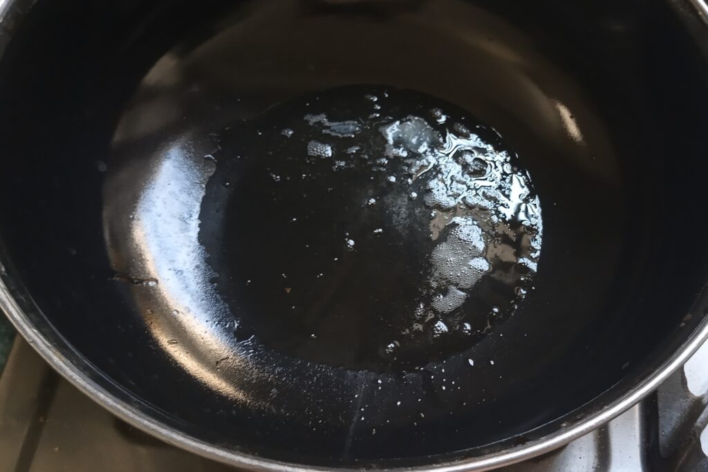 heating ghee in a kadai