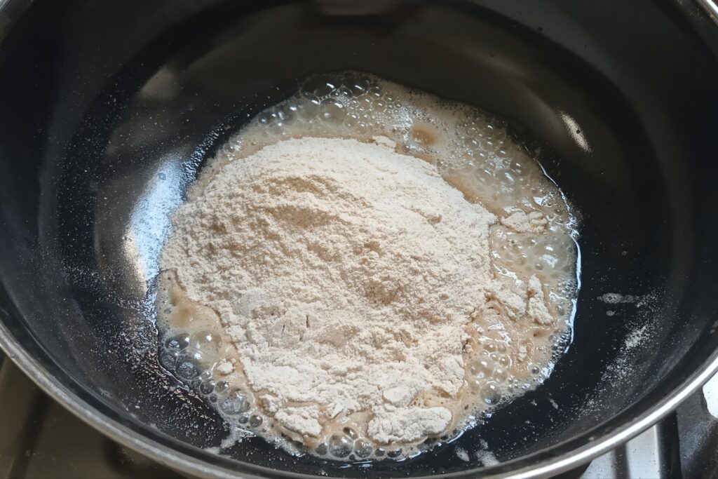 adding coarse wheat flour in ghee