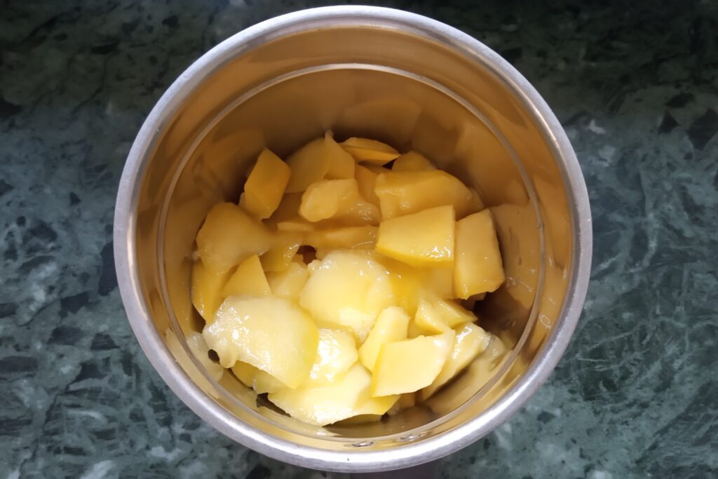 ripe and sweet mango pieces in a jar
