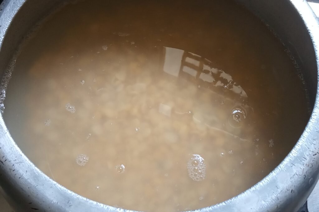 adding water to the dal