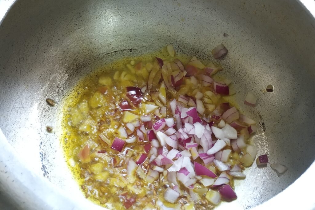 adding onion to saute
