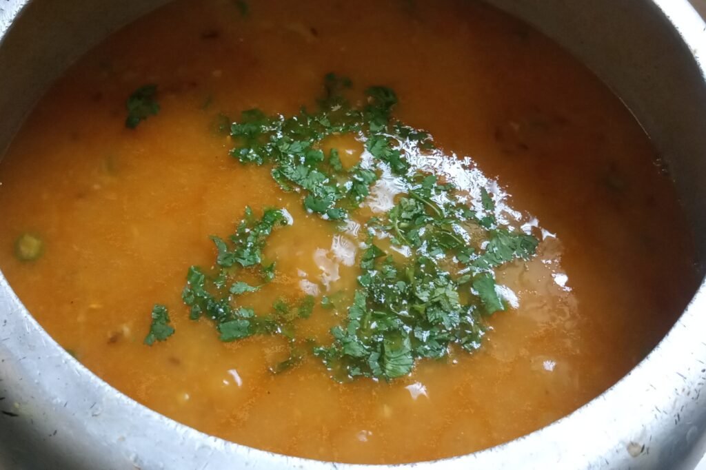 adding coriander leaves in dal