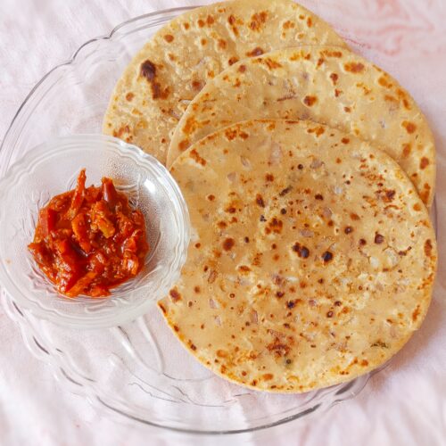 onion paratha recipe served with mixed pickle