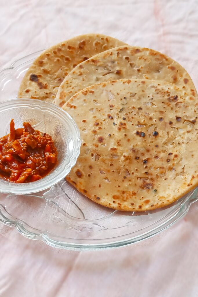 close up shot of delicious stuffed onion paratha